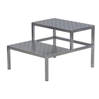 The Novocal 2-Tier Surgical Step is a two-tier metal platform with a diamond pattern, measuring 600 x 700 x 450 mm (WxDxH), featuring a larger lower tier and sturdy metal legs. The package contains one unit.