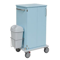 The Novocal Care and Utility Cart has a light blue metal frame with two doors, a side handle, large gray wheels on a solid plastic platform, and an attached trash can. Pictured against a white background.