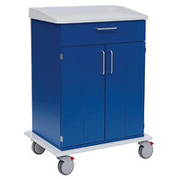 El carrito de cuidados y trabajo Novocal cuenta con una encimera blanca, un cajón extraíble, un armario de dos puertas y cuatro ruedas con detalles en gris y rojo, lo que facilita su almacenamiento y movilidad en centros asistenciales.