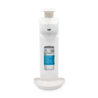 A white Dr. Schumacher wall dispenser SPE 1000 (from Dr. Schumacher GmbH) with a visible hand disinfectant bottle and lower drip tray, mounted in front of a simple light background.