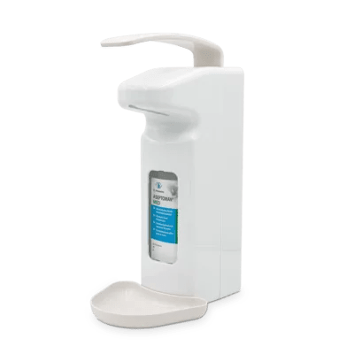 The Dr. Schumacher GmbH wall dispenser SPE 1000 (1 piece) is a white wall dispenser for hand disinfection with an upper lever and drip tray, in which a disinfectant bottle with a blue label is visible.