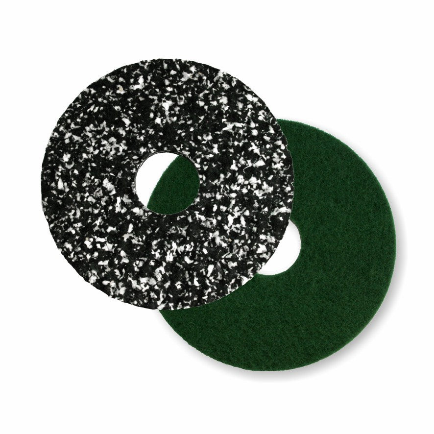 Dos almohadillas de suelo Arcora PU-PAD redondas de Arcora International GmbH - una negra con motas blancas, una verde, ambas con un agujero central - se superponen sobre un fondo blanco, perfectas para su máquina pulidora de suelos.