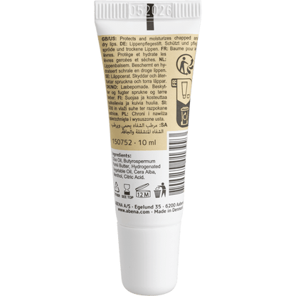 El tubo blanco de 10 ml del bálsamo labial de Abena Re-Seller GmbH con etiqueta beige contiene información del producto, instrucciones de uso en varios idiomas, ingredientes, símbolos, una tapa blanca y la fecha de vencimiento "05 2026" en la parte superior; disponible en cajas de 300 unidades.