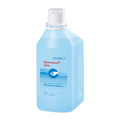 Eine Flasche Schülke desmanol® care Händedesinfektionsmittel der Schülke & Mayr GmbH mit weißem Verschluss und blauem Etikett, auf dem der Produktname und Informationen zur Anwendung zur hygienischen und chirurgischen Händedesinfektion prominent platziert sind.