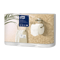 The image shows a package of Tork 110406 Extra Soft Premium T4 4-Ply Small Roll Toilet Paper, presented by TORK – Essity Professional Hygiene Germany GmbH. The packaging depicts a marble-tiled wall with a mounted holder and a white towel on a ring, ideal for upscale restrooms. This product is labeled as Premium Toilet Paper.