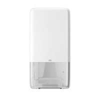 The Tork PeakServe® 552500 continuous-roll towel dispenser from the Elevation H5 series by TORK - Essity Professional Hygiene Germany GmbH is a wall-mounted white dispenser with a modern, rectangular design, ideal for high-traffic restrooms. Its semi-transparent lower section allows a view of the continuous towels inside, with a small logo prominently displayed in the center.