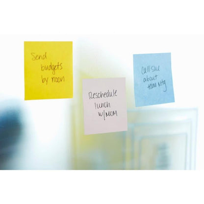 Three Post-it® Super Sticky Notes Cubes from 3M Deutschland GmbH, yellow, 76 mm x 76 mm, are on a glass surface - yellow: "Send budgets by noon", purple: "Reschedule lunch with mom", blue: "Call Sue about team meeting".