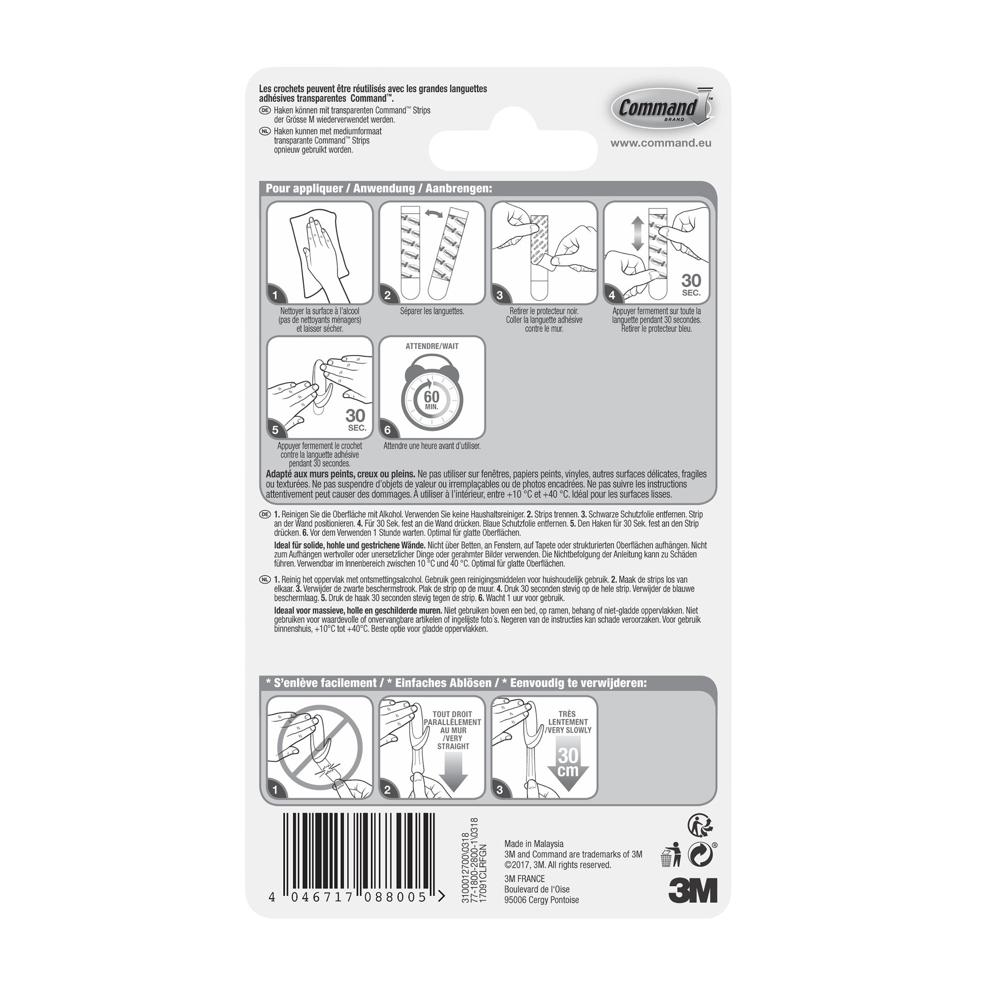 Die Rückseite der Command™ Haken M, mittelgroß, transparent (1 Stück, 3M Deutschland GmbH) zeigt mehrsprachige Anwendungs- und Entfernungsanleitung mit schwarz-weißen Abbildungen, Barcode, Recycling-Symbolen und dem 3M-Logo unten rechts.